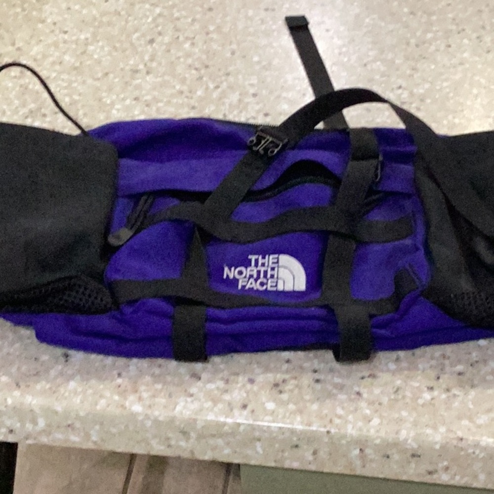 The North Face Blue and Black Backpack